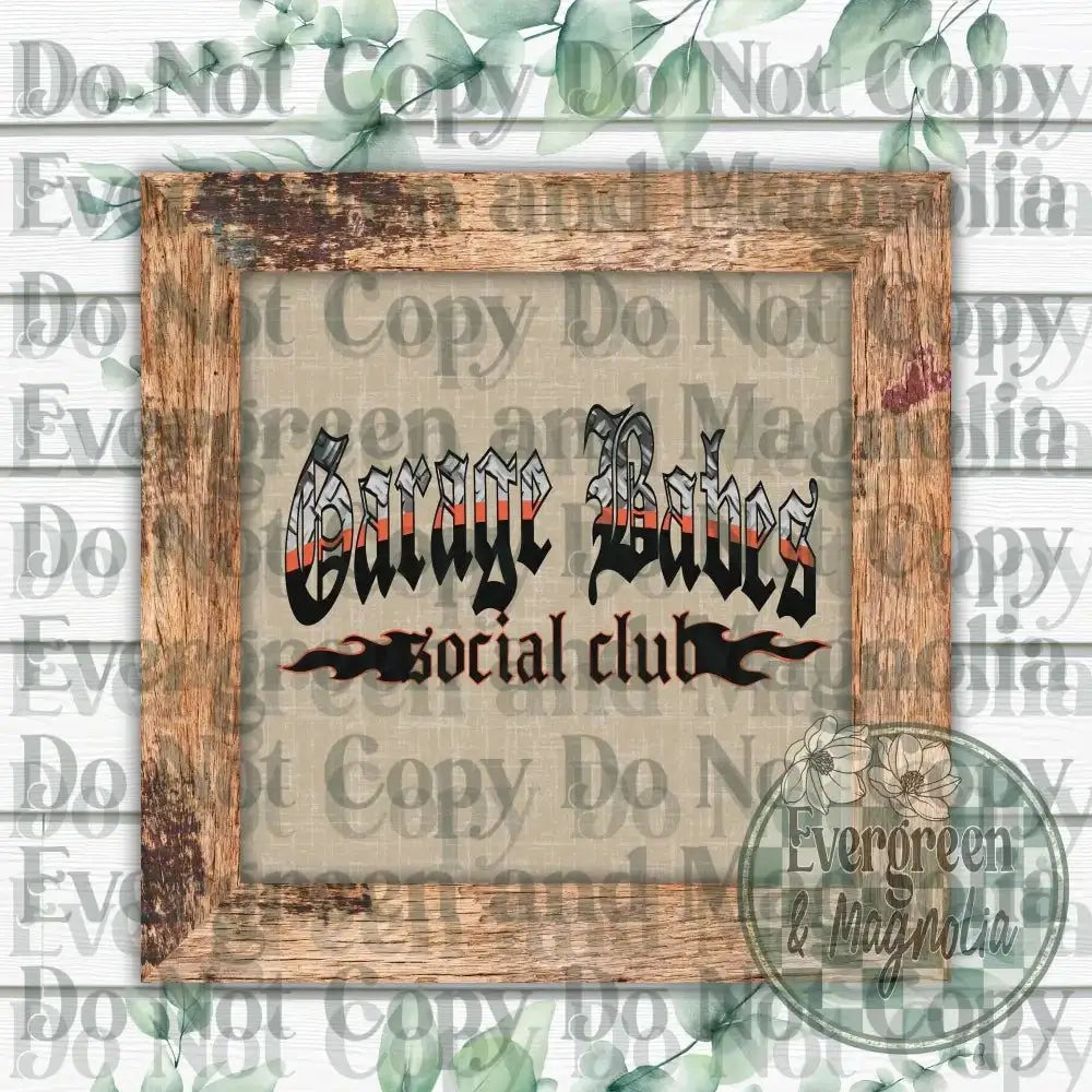 a wooden frame with the text "Garage Boys Social club" written on it, set against a background of green leaves and a white wooden wall.